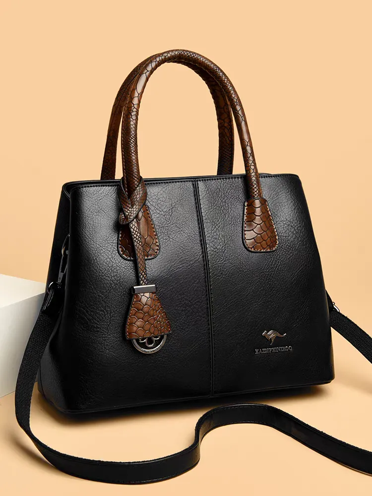 Imported women's black leather handbag Imported women's black leather handbag
