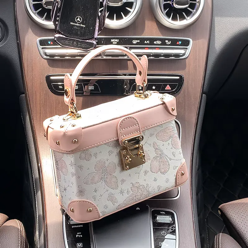 Pink women's handbag is trendy. Pink women's handbag is trendy.