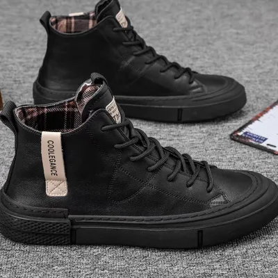 Stylish men's black leather ankle boot photo