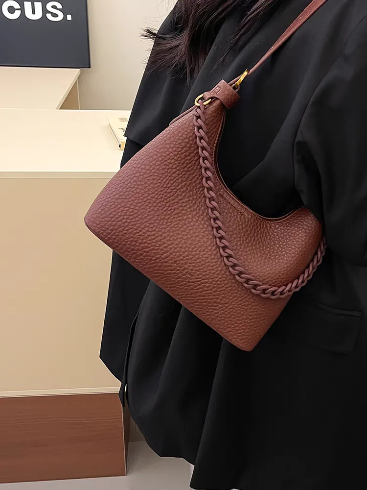 Original brown leather women's shoulder bag photo Original brown women's leather shoulder bag photo