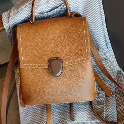 Fashionable brown leather women's handbag photo