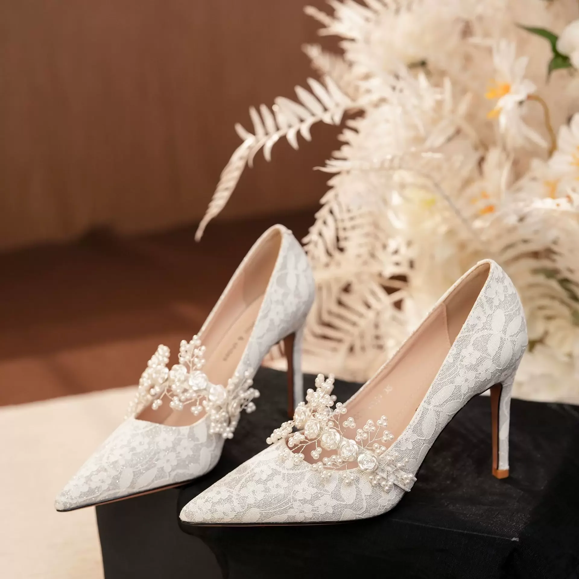 Photo of a stylish white wedding shoe for the year A stylish and modern white wedding shoe photo of the year