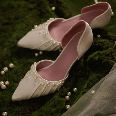 White pearl-embellished wedding shoes with stiletto heels, imported