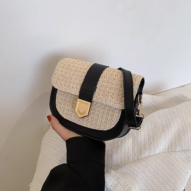 Imported women's black shoulder bag with woven texture and lock Imported women's black shoulder bag with woven texture and lock