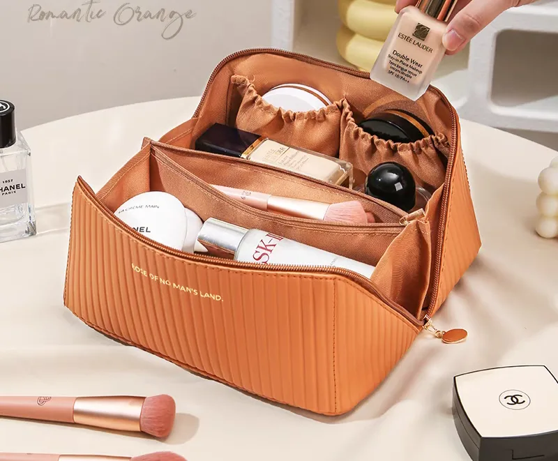 Orange zippered spacious makeup bag for girls and women, trendy and international Orange zippered spacious makeup bag for girls and women, trendy, international