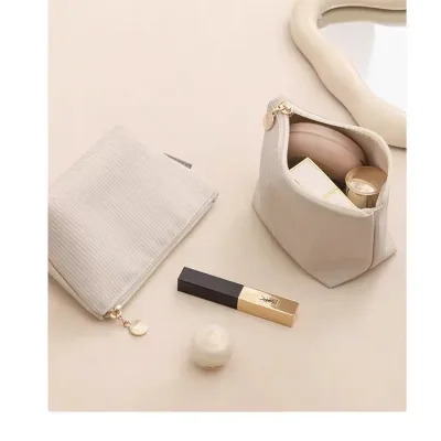 Trend of a girl's and woman's zipper makeup bag with cream