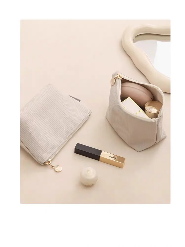 Trend of a girl's and woman's zipper makeup bag with cream Trend of a girl's and woman's zipper makeup bag with cream