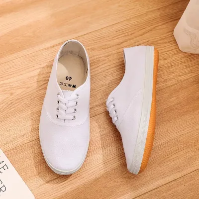 Buying white lace-up Vans sneaker model for women and girls, trendy international style