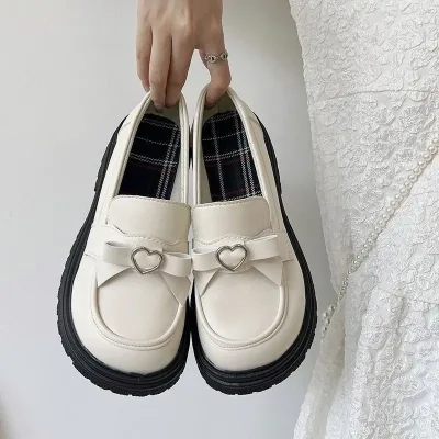 Buy genuine women's black and white slip-on loafers with platform heels