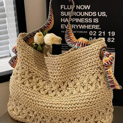 Buy an original knitted jute bag with rainbow-colored straps for girls and women