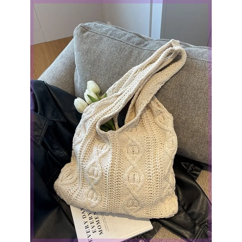 Buy an original white knitted shoulder bag for girls and women. Buy a white knitted shoulder bag made of yarn, original for girls and women