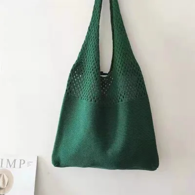 Stylish original knitted shoulder bag in emerald green for girls and women