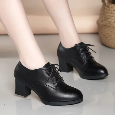 Imported women's black leather formal shoes photo