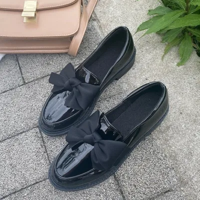 Buy women's and girls' black patent leather college shoes with bow from Vardelty