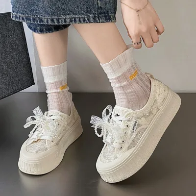 Photo of a genuine white leather wedding sneaker