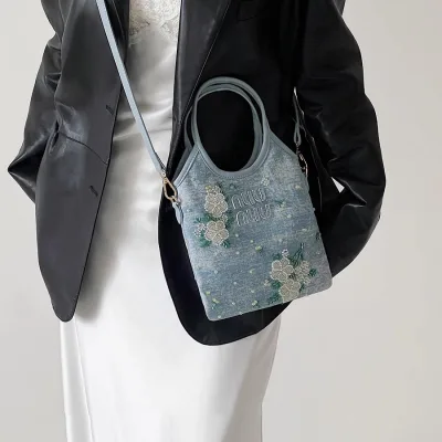 Blue women's and girls' handmade and shoulder handbag (purse) from a foreign brand