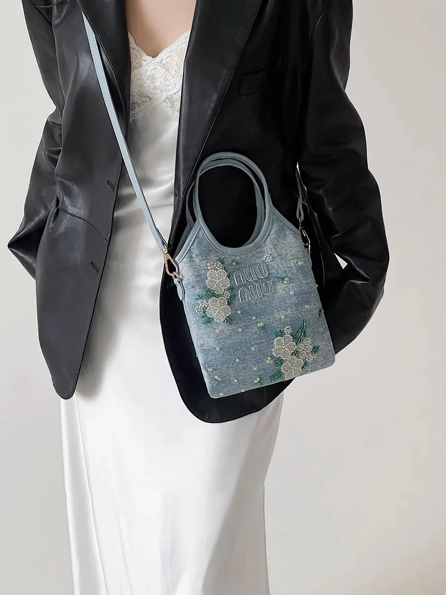 Blue women's and girls' handmade and shoulder handbag (purse) from a foreign brand Blue women's and girls' handmade and shoulder handbag (purse) from a foreign brand