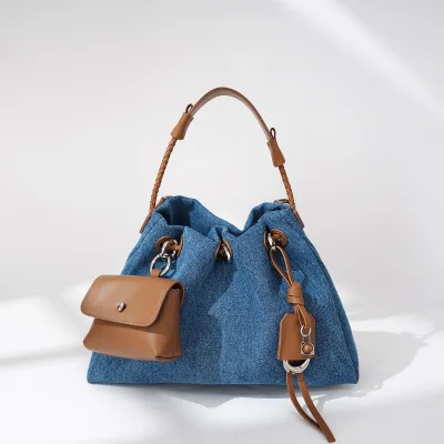 Blue women's and girls' handbag with brown strap and shoulder strap, foreign